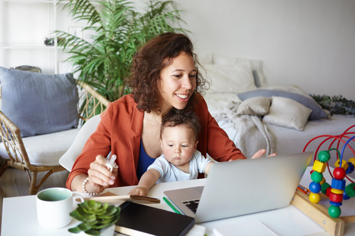 Mother working with her child